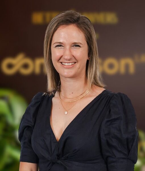 Professional woman smiling in office setting, highlighting expert legal services, corporate law, and business support from Enterprise Legal, Australia's trusted legal advisors.